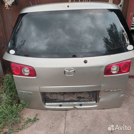 Дверь багажника mazda demio