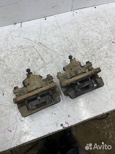 Задний тормозной суппорт Kia Cerato 2 Koup