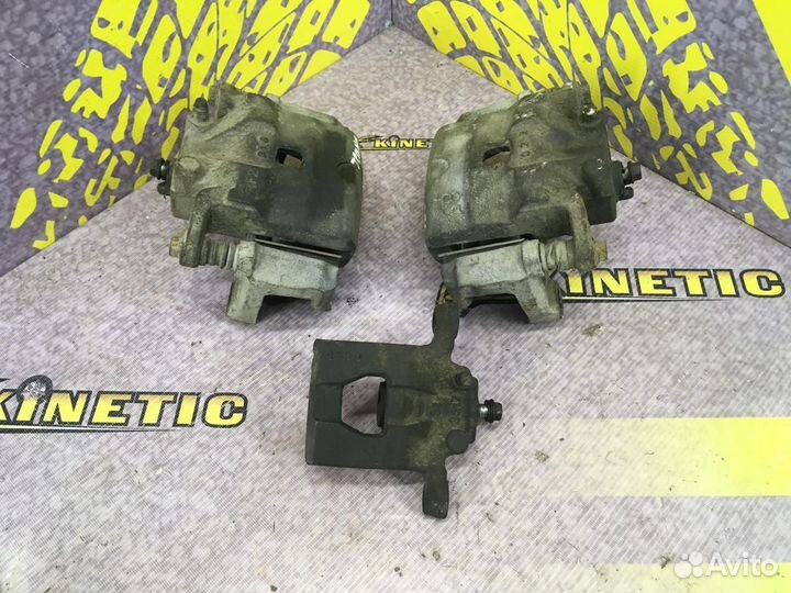 Суппорт тормозной передний задний Ниссан Теана J32