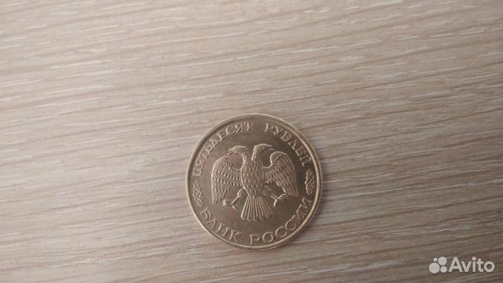 Продам манету