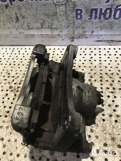 Суппорт тормозной передний левый Mazda CX-5