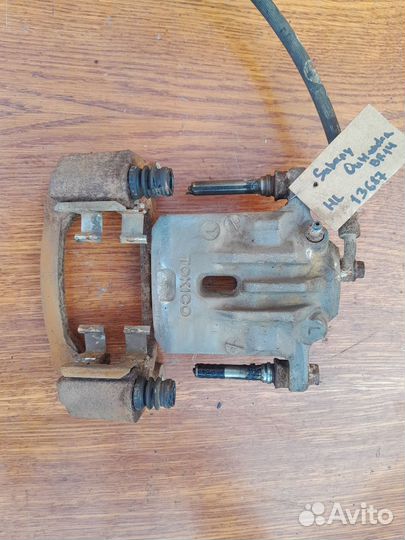 Суппорт задний левый Subaru Outback BR/B14