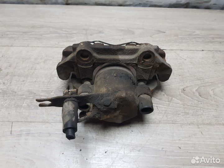 Суппорт передний левый Volkswagen Passat B5