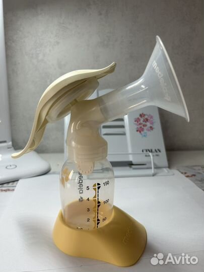 Молокоотсос medela ручной