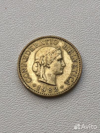 Монета пять раппенов 1982 года Швейцария