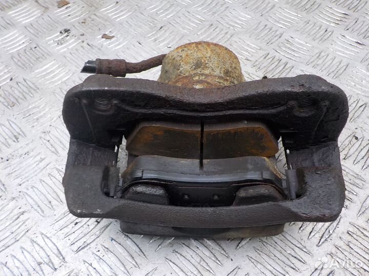 Суппорт тормозной передний левый Hyundai Solaris 2