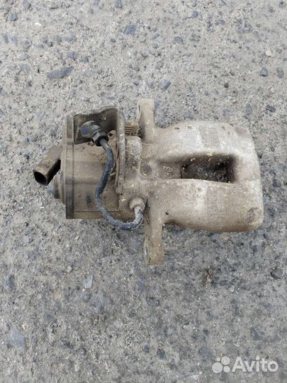 Суппорт тормозной задний левый