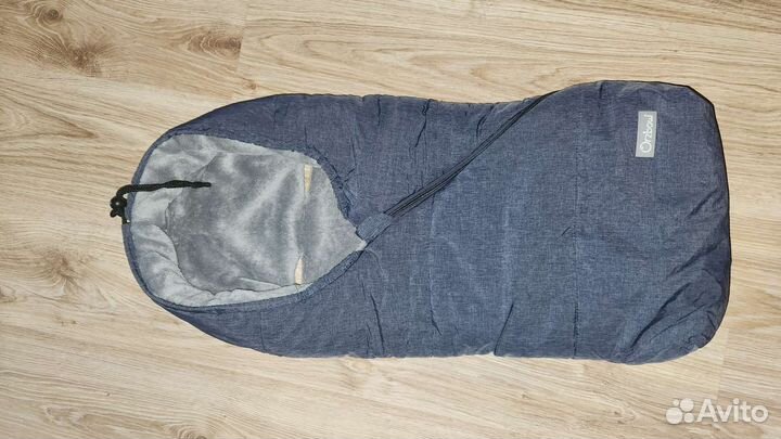 Теплый конверт в коляску для новорожденных