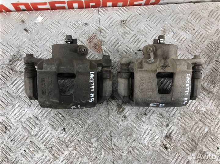 Суппорт передний правый Шевроле Лачетти