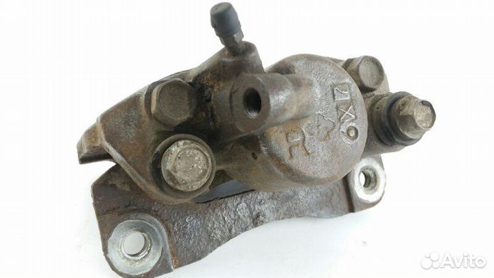 Суппорт задний правый Mitsubishi Pajero Sport K96W