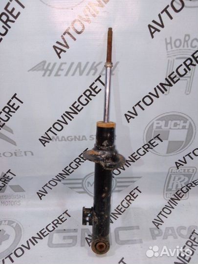 Стойка амортизатор передняя Mitsubishi L200