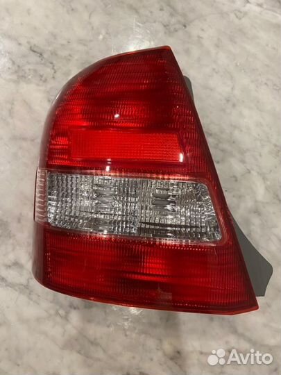 Стоп-сигнал задний левый Mazda Familia BJ