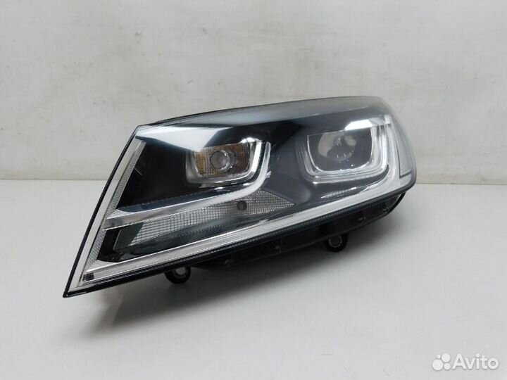 Фара левая Volkswagen Touareg