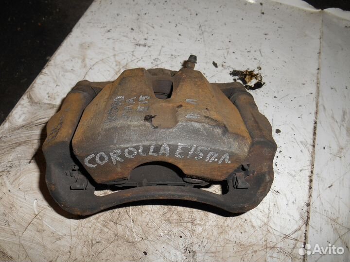 Суппорт передний левый Toyota Corolla E15 E150