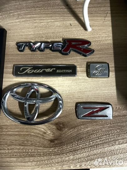 Эмблема toyota honda