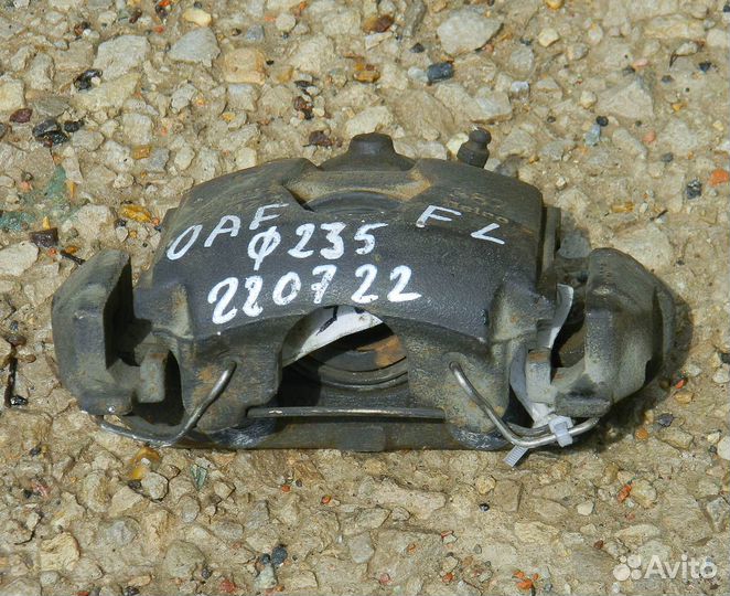 Суппорт передний левый Opel Astra F 1.6