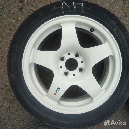 Лето Bridgestone 195/50 р15 на ковках Slik 4x98