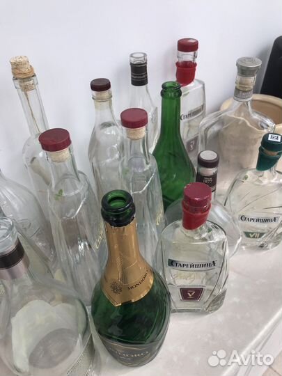Бутылки стеклянные от коньяка и шампанского