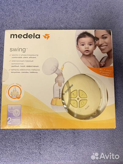 Молокоотсос medela swing электрический