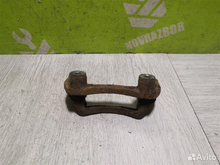 Скоба суппорта заднего Киа Сепия Шума 96-01