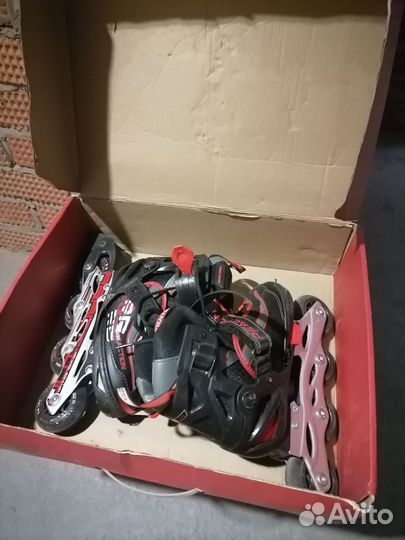 Коньки роликовые