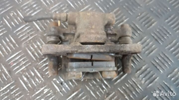 Суппорт задний правый Mitsubishi Lancer/Lancer Evolution