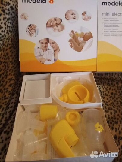 Молокоотсос medela электрический
