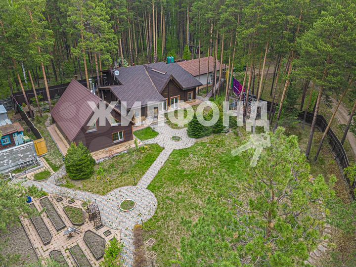 Коттедж 603 м² на участке 23,6 сот.