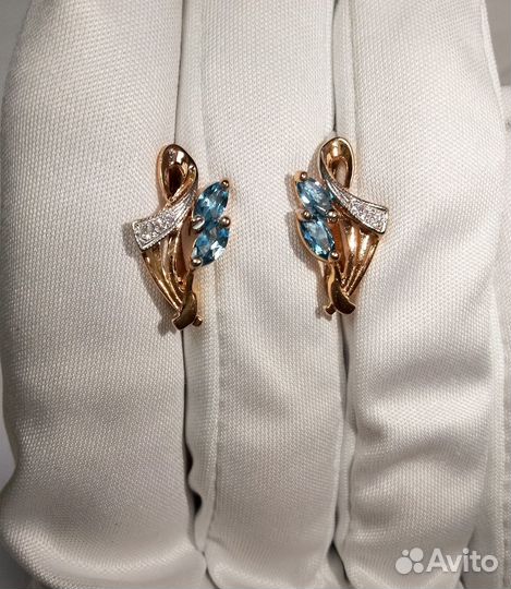 Золотые серьги с камнем