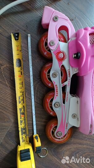 Роликовые коньки