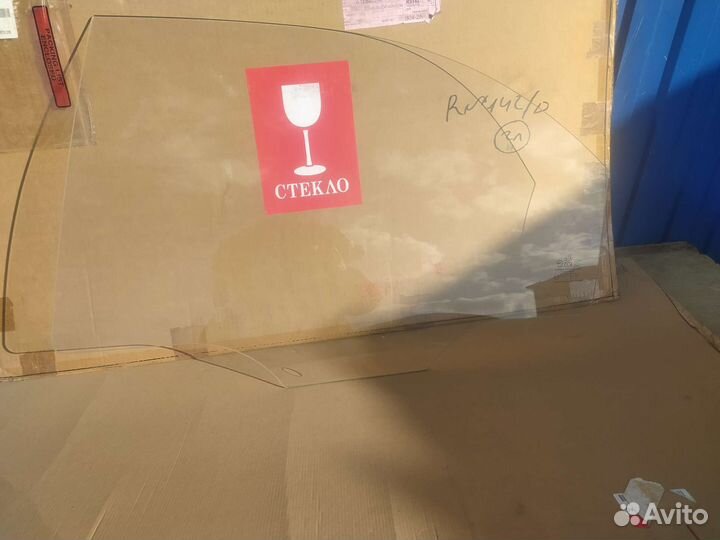 Стекло заднее левое Kia Spectra