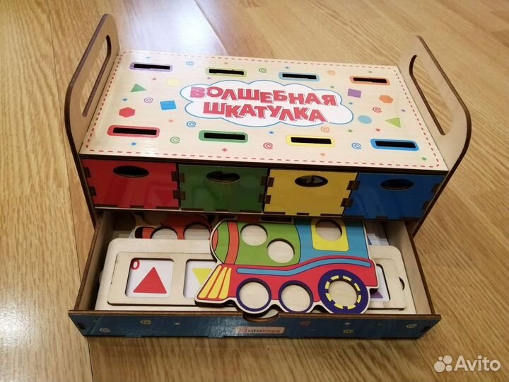 Развивающие игрушки. Машина каталка