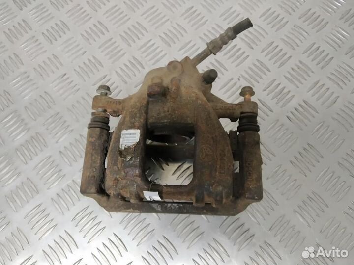 Суппорт тормозной задний левый Mercedes-Benz