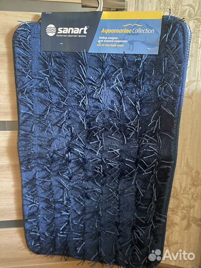 Новые коврики для ванной