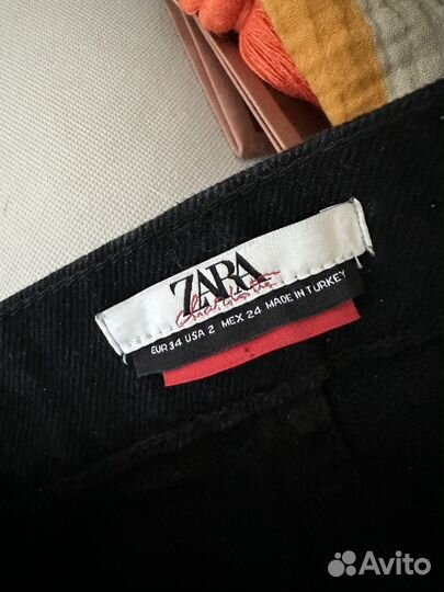 Джинсы Zara с разрезами 34