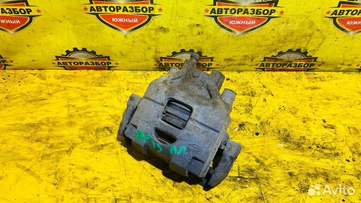 Суппорт тормозной передний правый Toyota Yaris