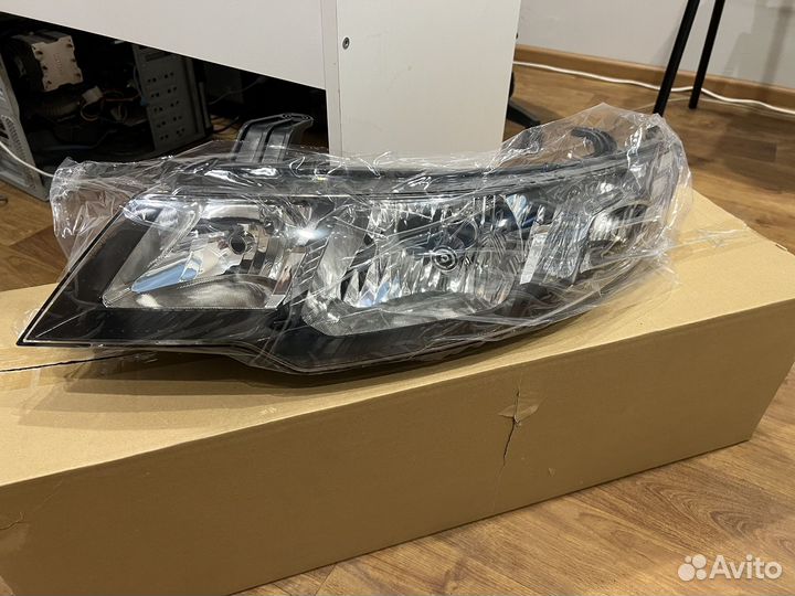 Фара левая Kia Cerato 2008-2013
