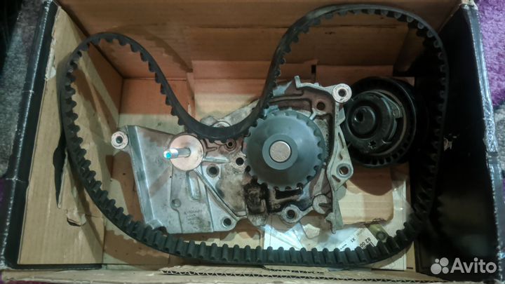 Комплект грм с помпой Логан 10г/два ролика