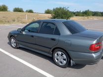 Mitsubishi Carisma 1.6 MT, 2003, 380 000 км, с пробегом, цена 385 000 руб.