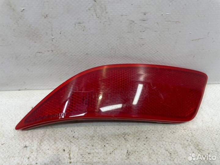 Отражатель бампера задний левый Toyota Camry XV55