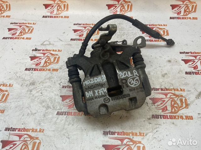 Суппорт тормозной задний правый Mazda 3 BM хетчбек