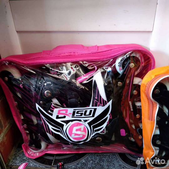 Роликовые коньки