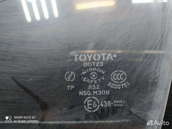 Стекло двери переднее правое Toyota Corolla 120