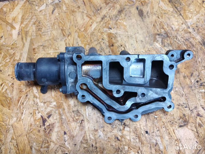 Корпус термостата Renault Logan 1 K4M