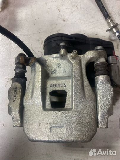 Суппорт тормозной задний правый Mitsubishi