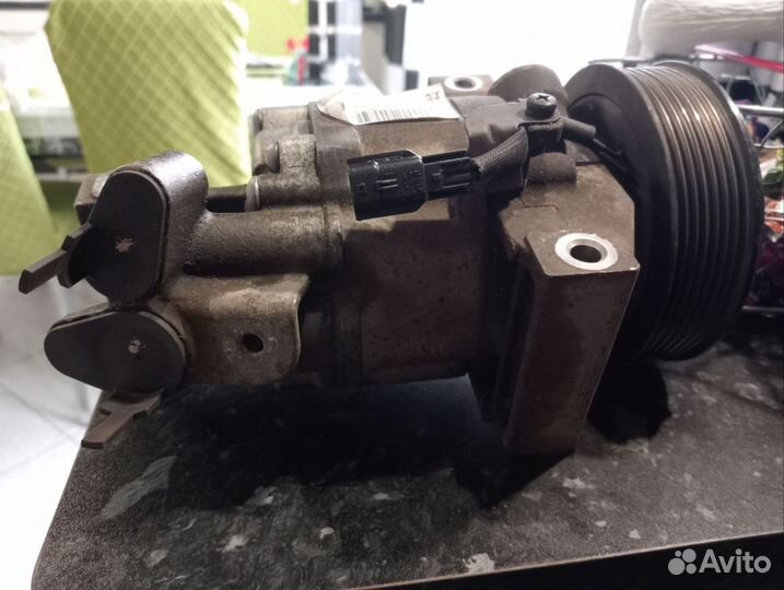 Компрессор кондиционера автомобильный
