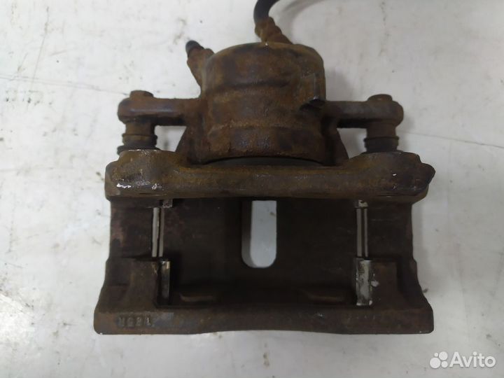 Суппорт тормозной передний левый Almera (G15) 2013