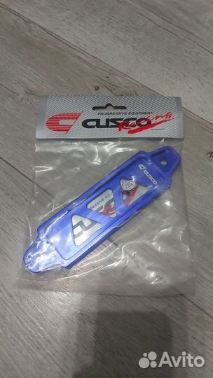 Крепление аккумулятора cusco
