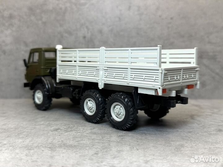 Модель грузовика камаз 4310 борт хаки 1:43