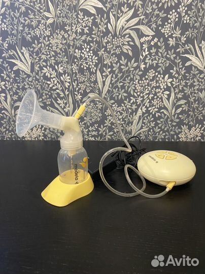 Молокоотсос medela